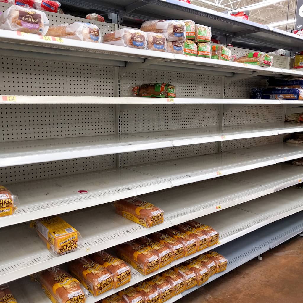 Empty shelves during hurricane food preparation