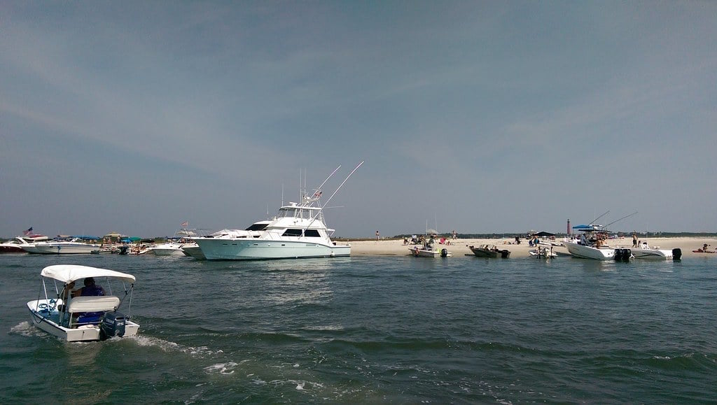 boats anchored near new smyrna beach at disappearing island in ponce inlet, florida