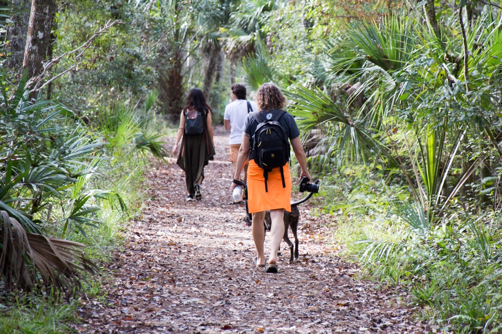 People walk on the trail to Buford Springs