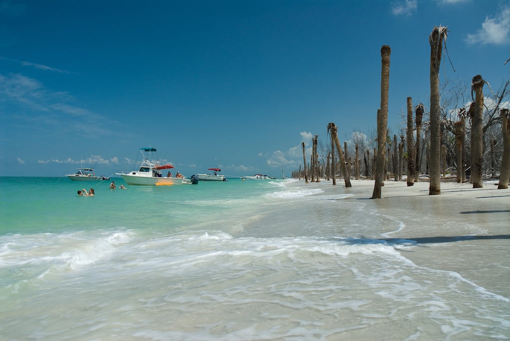 Private boat tours anchor off the beach on Egmont Key