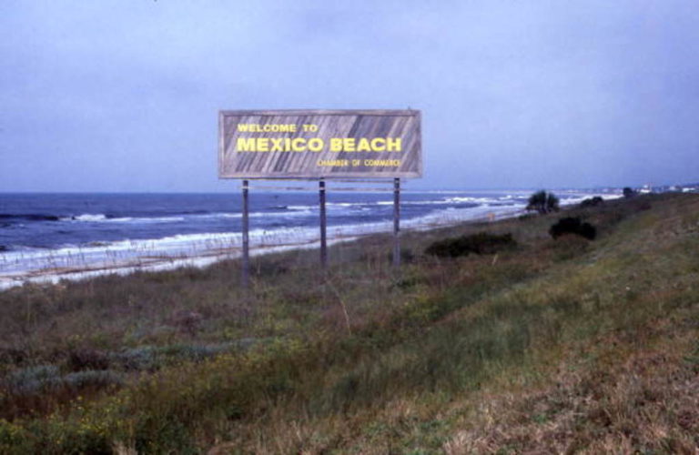 A welcome sign on the beach in Mexico Beach, Florida