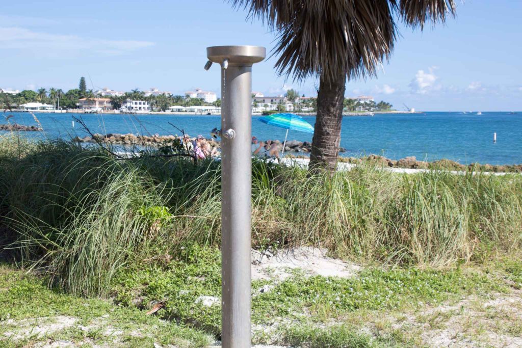Open-air rinse showers are sprinkled around Peanut Island