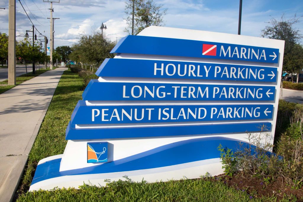 A sign for Peanut Island Parking at the Riviera Beach Marina Village