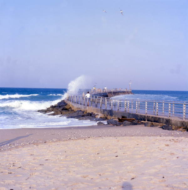 A large wave at the Sebastian Inlet jetty, Florida