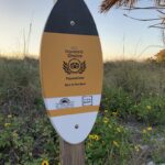 A sign in Florida marks "Florida's Best Beach" according to user reviews, experts and TripAdvisor