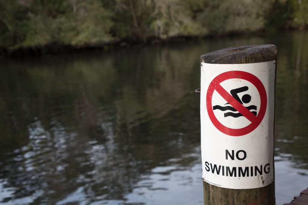 A Sign says "No Swimming" in the Chassahowitzka River