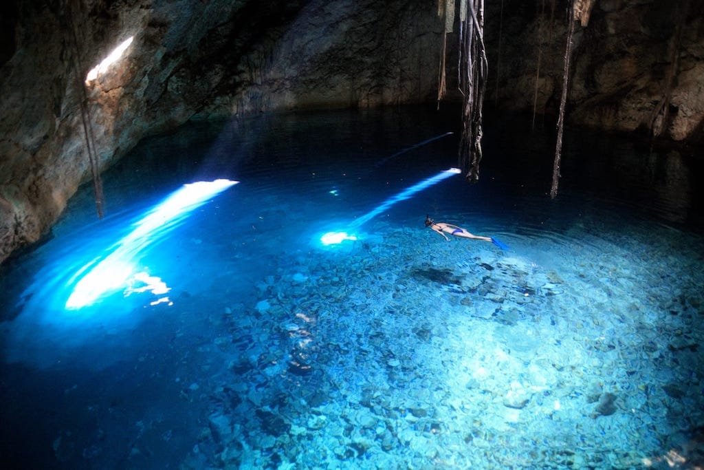 Devil's Den Prehistoric Spring, a natural freshwater spring in Florida, snorkeling woman