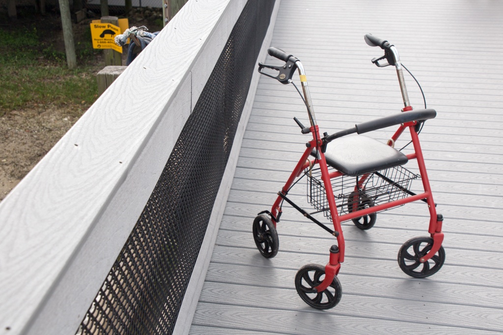 A mobility walker on a boardwalk in the TECO Manatee Viewing Center in Tampa