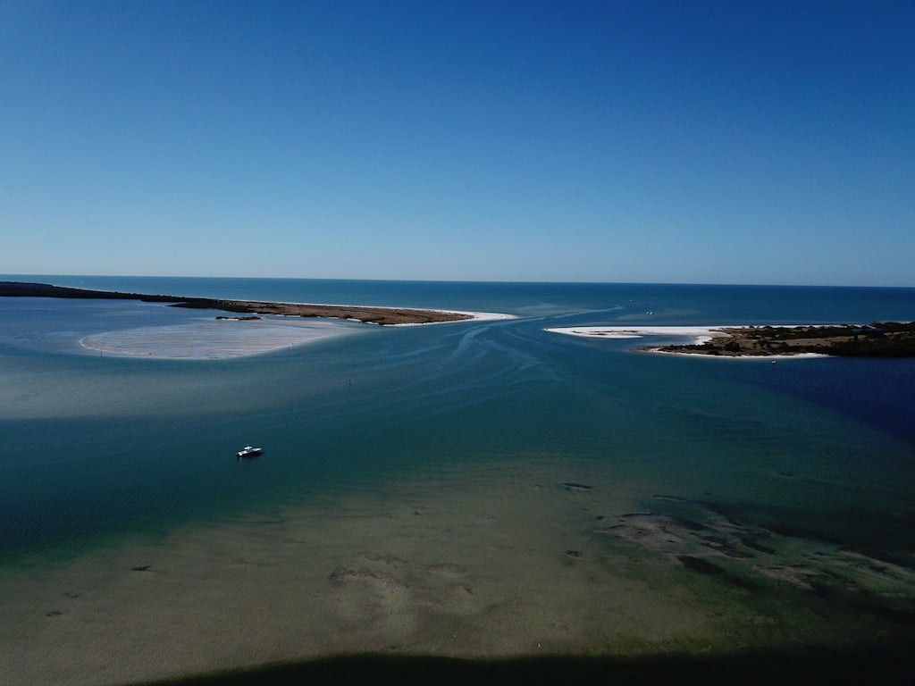 Caladesi Island is separated from Honeymoon Island by Hurricane Pass.