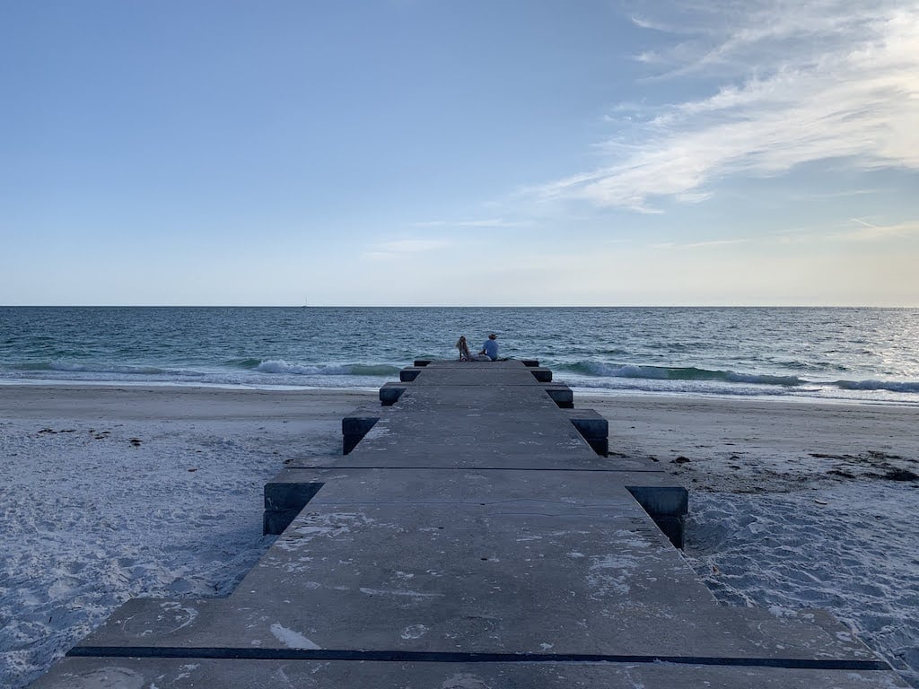 Public beach on Longboat Key with calm clear blue water