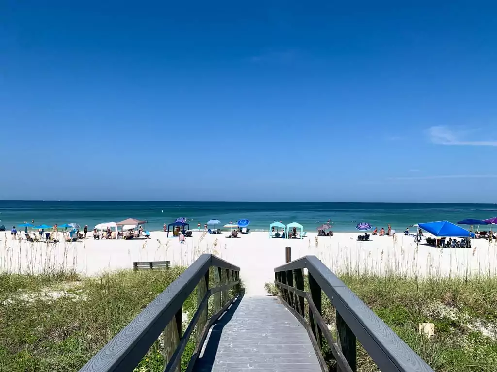 Pass a Grille Beach, Florida. A wooden boardwalk gives access to the beach, one of the best beaches in Florida.