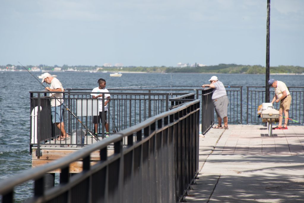 Fishermen on the fishing pier at Phil Foster Park