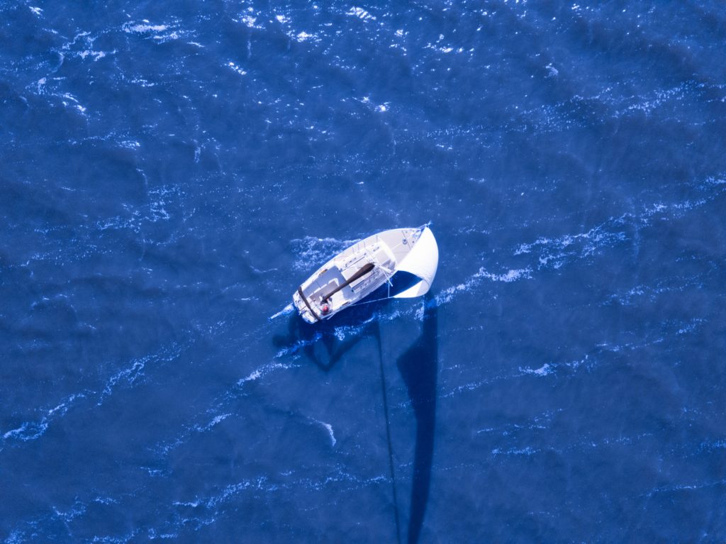 Sailboat sailing view from aerial drone photograph